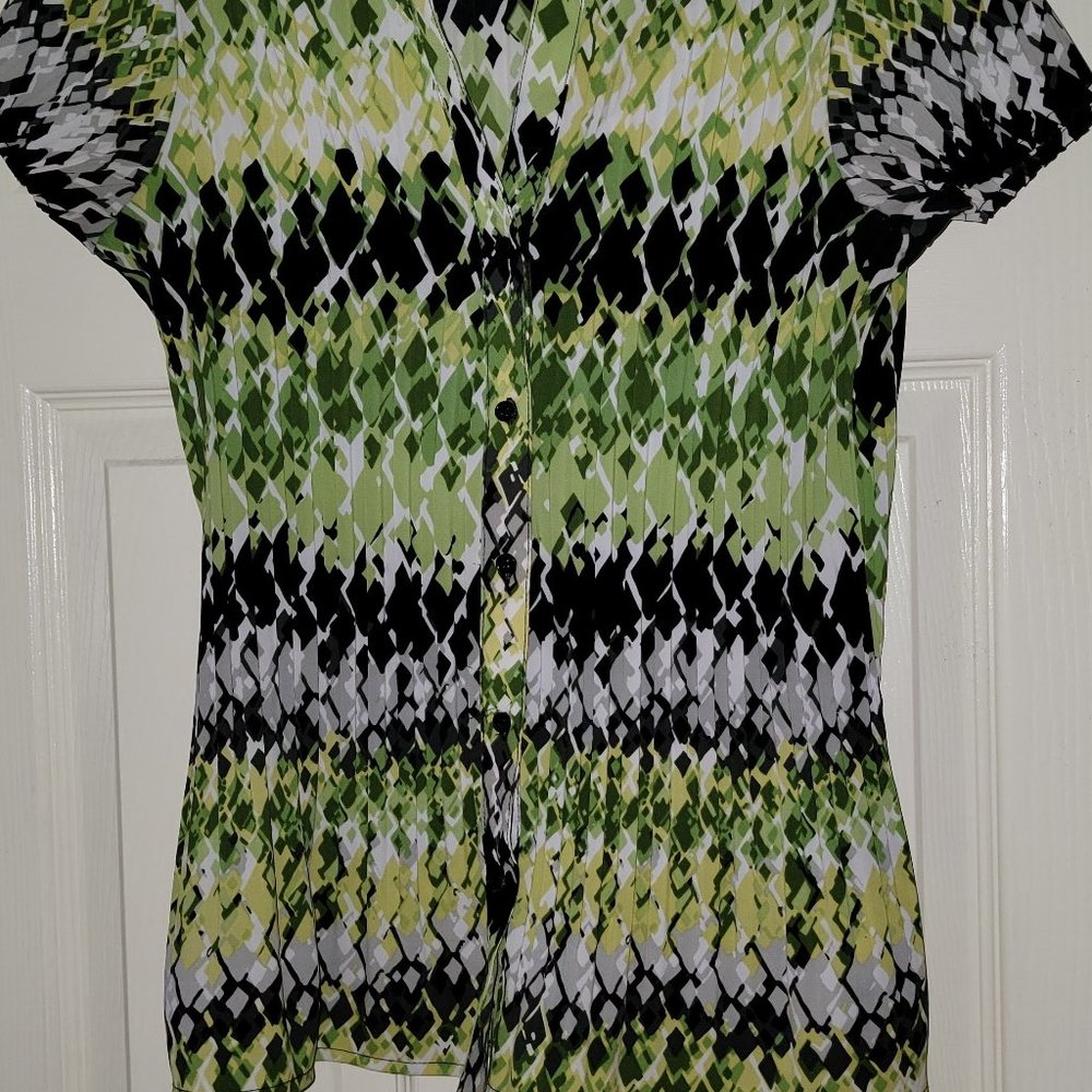 Two button up woman's shirts